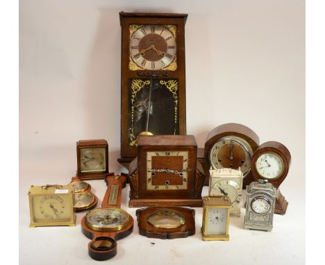 Two boxes of mid 20th century clocks to include mantle clocks, alarm clocks and a wall clock (2)