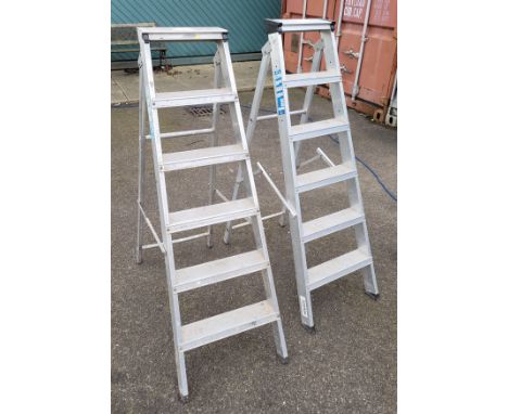 A Youngman five height folding aluminum step ladder, together with a Wickes five height folding step ladder. (2)