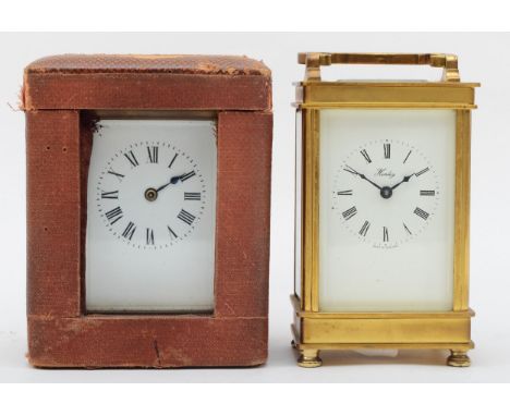A 20th century brass cased carriage clock in original carrying case, 14cm high together with a 20th century Henley brass case