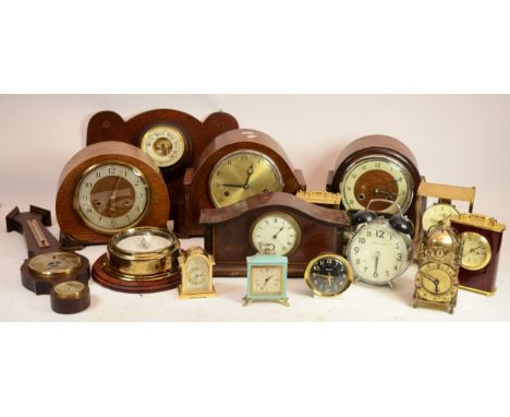 Two boxes of assorted mid 20th century clocks to include miniature clocks, mantle clocks and a reproduction brass lantern clo