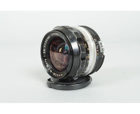 A Nikon Nikkor-N.C Auto 24mm f/2.8 AI Wide Angle Lens, serial number 410281, barrel G, wear to focus ring, scratches, element
