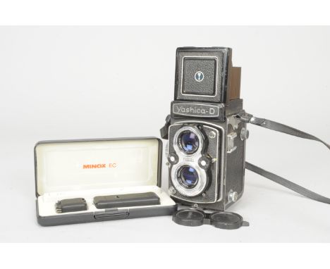 A Minox EC Camera and a Yashica D TLR  Camera, a Minox EC 9.5mm sub-miniature camera in maker's presentation case and a Yashi