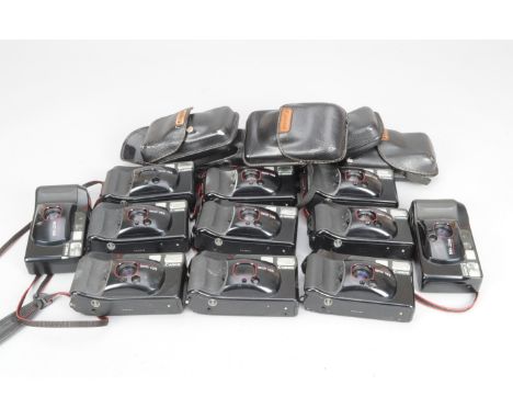 Eleven Canon Sure Shot Compact Film Cameras, ten Sure Shot Supreme and a Sure Shot Supreme Quartz Date, seven with cases, som
