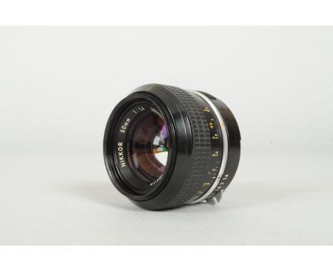 A Nikon Nikkor 50mm f/1.4 Non AI Lens, serial no 2803438, Barrel G-VG, slight marks to mount ring, elements G, some internal 