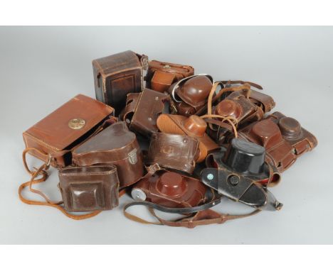 A Carton of Camera Cases, approximately 14 leather ever ready and pouch cases in light tan, dark tan and black including Cont