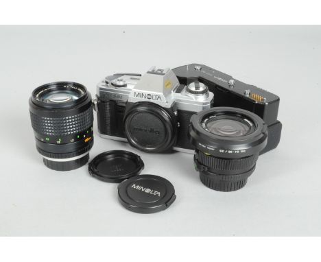 A Minolta X-300 SLR Camera, chrome, shutter working, body VG, with 100mm f/2.5 tele rokkor, 24-35mm f/3.5 MD zoom, barrels VG