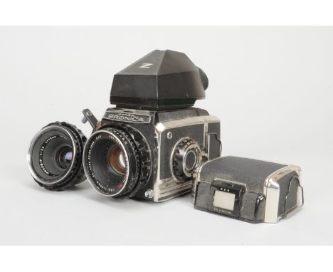 A Zenza Bronica S2 Camera, shutter firing, with Zenzanon MC 80mm f/2.8, F, Nikkor-P 75mm f/2.8, F, lenses, prism viewfinder, 