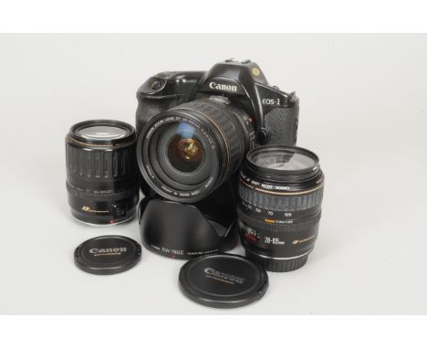 A Canon EOS-1 Camera, with, EF 28-135mm f/3.5-5.6 IS Ultrasonic, EF 28-105mm f/3.5-4.5 Ultrasonic, 35-135mm f4.5.6 Ultrasonic