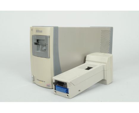 A Nikon Coolscan V ED Slide and Film Scanner,  with SR-21 strip film adapter, cables and manual, untested 