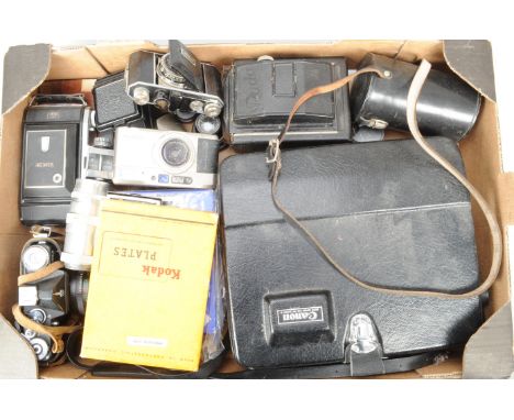 A Tray of Cameras and Accessories, including a Contax T VS camera, a Zenit EM SLR camera, a folding plate camera, a Zeiss Iko