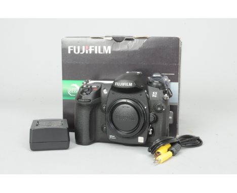 A Fujifilm Finepix S5 Pro DSLR Body, no. 73Q03754, condition VG, with 2 batteries, charger, instructions, software CD, strap,