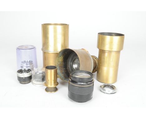 Brass and Other Lenses, three large magic lantern brass lenses, together with a Canon EF 35-105mm f/4.5-5.6 lens, a Scheider-