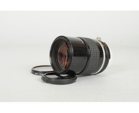 A Nikon Nikkor 135mm f/2.8 AI-S Lens, serial no 933619, barrel G, slight scratches, wear to mount ring, elements F-G, scratch