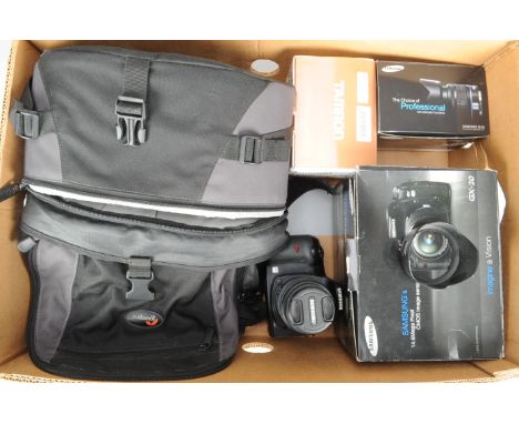 A Samsung GX-20 DSLR Camera, and Lenses, battery, no charger, a Samsung SA 18-55mm f/3.5-5.6 AL zoom lens, a Tamron SP AF asp