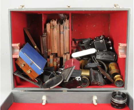 A Large Wooden Trunk of Lenses and Camera Parts, including brass lenses, a Carl Zeiss Jena Flektogon 20mm f/4 lens with an Ex