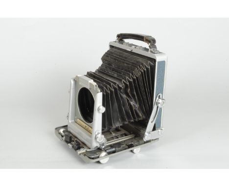 A Musashino Koki 5 x 4in Rittreck View Camera, P, no lens, bellows badly split, rear viewing screen present, no film holders 