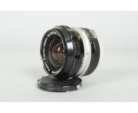 A Nippon Kogaku  Nikkor-N Auto 24mm f/2.8 Non AI Wide Angle Lens, serial number 262266, barrel G, silight wear to focus ring,