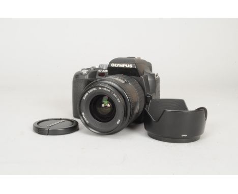 An Olympus E-500 Four -Thirds DSLR Camera, powers up, otherwise untested, with a Zuiko Digital 14-45mm f/3.5-5.6 zoom lens, t