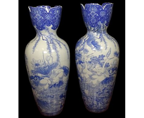 Pair of Vintage Japanese Blue and White Porcelain Palace Vases. Each Featuring a Motif of Egrets in the water feeding and Sur