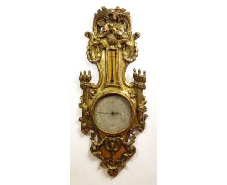 18/19th Century French Carved Gilt Wood Barometer. Hand painted Dial and Gauge. Typical Wear, Cracks and Minor Losses Consist