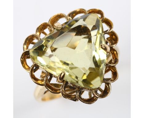 A Continental 14ct gold lemon quartz dress ring, setting height 18.3mm, size K, 4.3gNo damage, settings slightly worn with a 