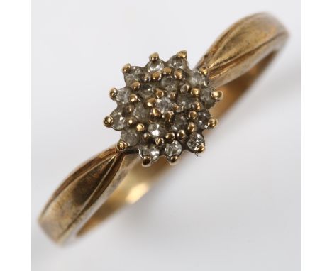 A 9ct gold diamond cluster dress ring, set with single-cut diamonds, setting height 7.9mm, size S, 2.9gNo damage or repairs, 