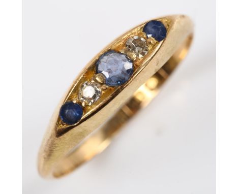 An early 20th century 18ct gold graduated five stone sapphire and diamond half hoop ring, maker's marks JG, indistinct hallma