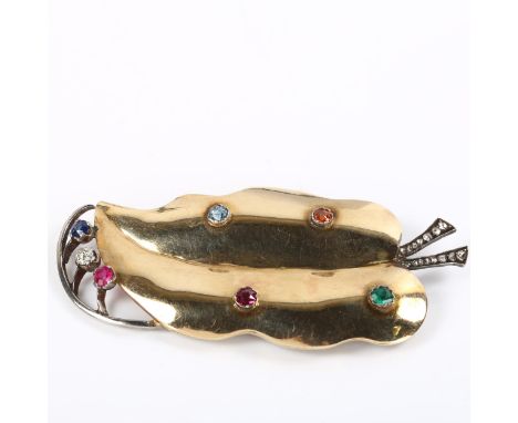 A large Art Deco gem set leaf brooch, unmarked gold and silver settings, gemstones include emerald ruby sapphire diamond citr