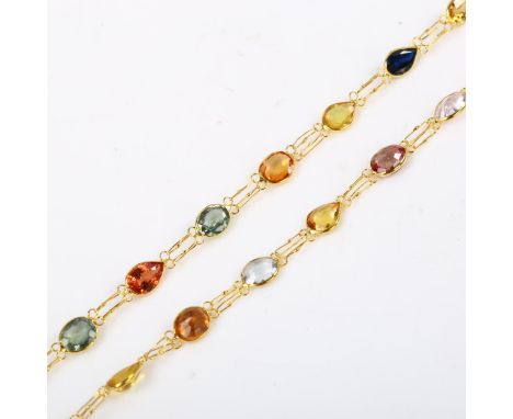 A 14ct gold vari-hue sapphire and ruby line necklace, set with oval and pear-cut gemstones, necklace length 52cm, 5.2gNo dama