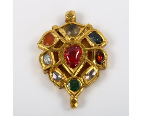An Eastern gem set pendant, unmarked yellow metal settings, gemstones include ruby diamond emerald moonstone coral etc, penda