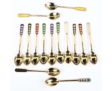 EGON LAURIDSEN - a set of 14 Danish vermeil sterling silver and harlequin enamel shamrock coffee spoons, length 10cmNo damage