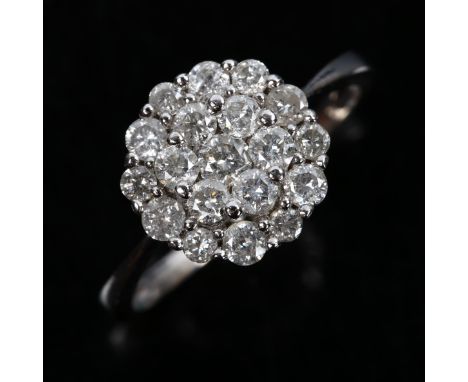 A 9ct white gold diamond cluster ring, set with modern round brilliant-cut diamonds, total diamond content approx 1ct, settin