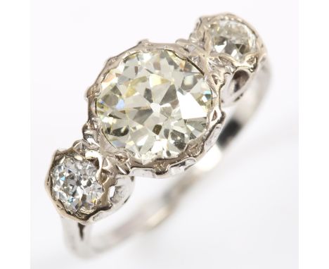 A fine 3-stone diamond ring, principal old cut diamond approx 2.08ct, colour approx L/M, clarity approx VS2/SI1, flanked by t
