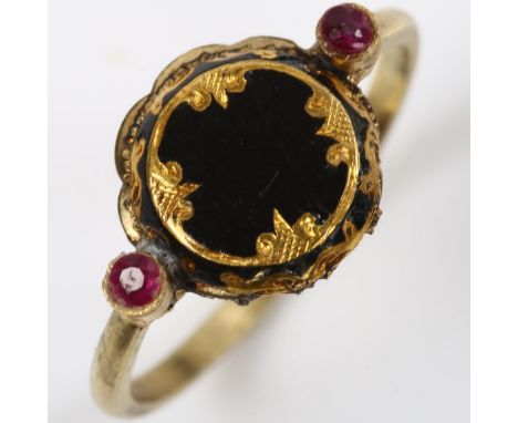 An Antique black enamel and ruby mourning ring, unmarked gold settings with engraved closed-back head, setting height 11.3mm,