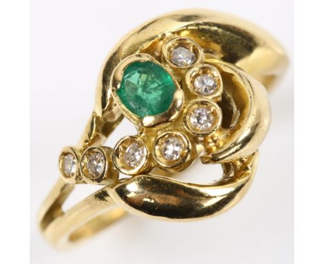 An 18ct gold emerald and diamond dress ring, set with oval mixed-cut emerald and single-cut diamonds, setting height 12.8mm, 