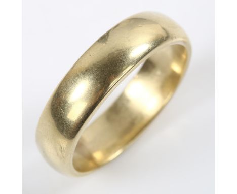 An unmarked gold wedding band ring, tests as 9ct, band width 6.7mm, size Z+, 12.2gRing probably made from sentimental gold an