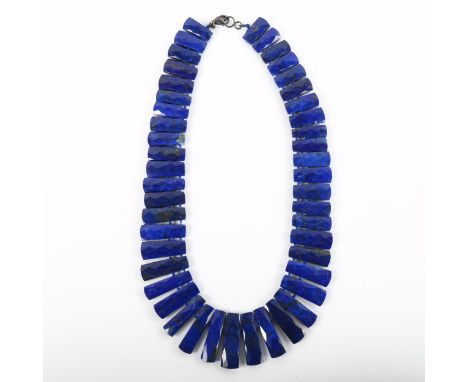 A Vintage graduated lapis lazuli tablet fringe necklace, oxidised sterling silver clasp, necklace length 40cm, 99.1gNo damage