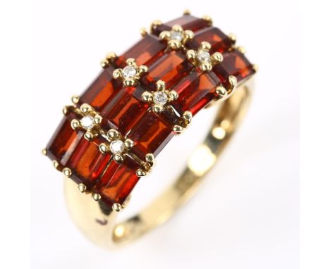 A 9ct gold garnet and diamond dress ring, setting height 10.5mm, size R, 3.8gNo damage or repairs, all stones present, settin