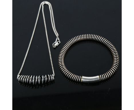 A Danish modernist sterling silver jewellery set, comprising bangle and pendant necklace, bangle internal diameter 6cm, neckl