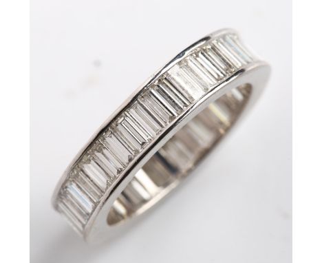 A platinum diamond full eternity ring, set throughout with baguette-cut diamonds, total diamond content approx 5ct, colour ap