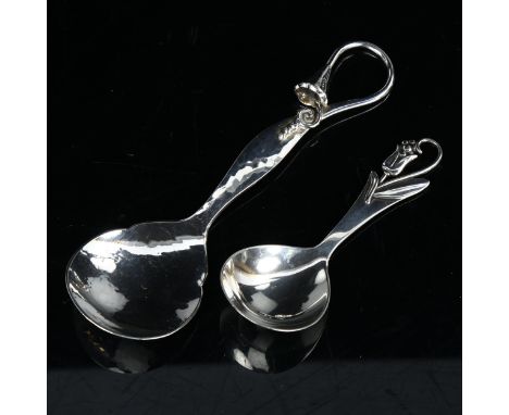 An Art Nouveau Danish silver caddy spoon and similar preserve spoon, largest length 14.5cm, 1.4oz total (2)No damage or repai