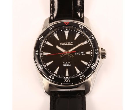 SEIKO - a stainless steel 100M Solar quartz wristwatch, ref. V158-0AY0, black fluted dial with luminous arrowhead hour marker
