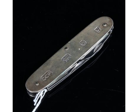 An Elizabeth II silver multi-tool penknife, maker's marks CCP, hallmarks London 1998, length 9cmNo damage or repairs, only ge