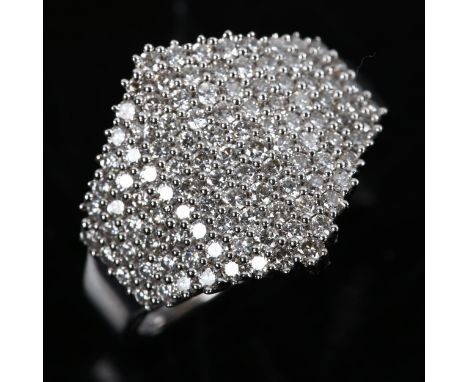 An 18ct white gold diamond cluster dress ring, pave set with modern round brilliant-cut diamonds, total diamond content appro