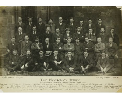 'The Mountjoy Heroes' A very rare photographic postcard showing a group of about 25 men who took part in 'The Great Hunger St