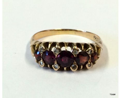 A Victorian set 18ct gold ring with approx 2ct ruby and 0.5 diamonds