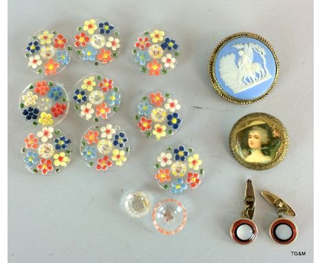 A pair of gilt metal cufflinks with mother of pearl centres, a Jasper Ware brooch, button depicting a lady and 11 colourful f