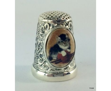 Silver and enamel set thistle with image of a Persian cat