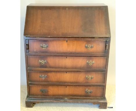 Mahogany 4 drawer fitted bureau with brass handles on bracket feet 100 x 75 x 50cm