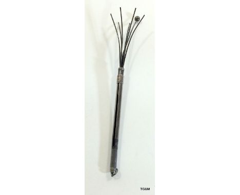 Silver cocktail swizle stick